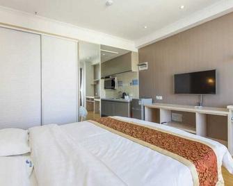 Weihai Yinxiang Holiday Apartment - Weihai - Bedroom