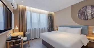 Home Inn (Hangzhou Xiaoshan International Airport Yipeng Shopping Center) - Hangzhou - Bedroom
