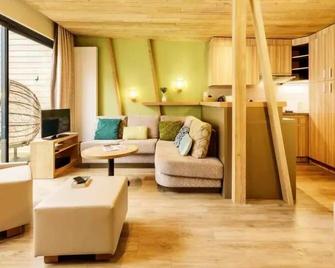 Center Parcs - Domaine Le Bois aux Daims - 5 Room Cottage 8 People Premium - Les Trois-Moutiers - Sala de estar
