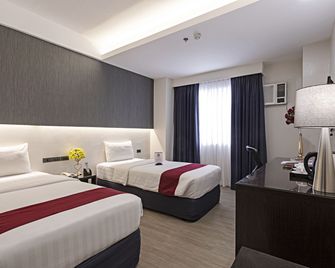 Sarrosa International Hotel and Residential Suites - Cebu City - Kamar Tidur