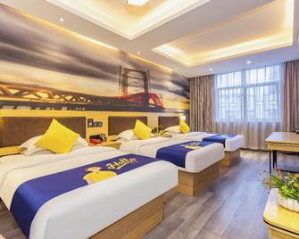 Jiemei Business Hotel Zhengzhou Youhao Hotel - Chenzhou - Schlafzimmer