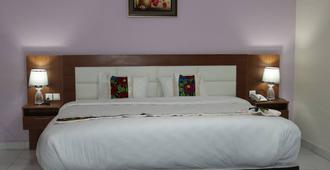 Rhogem Hotel - Takoradi - Bedroom