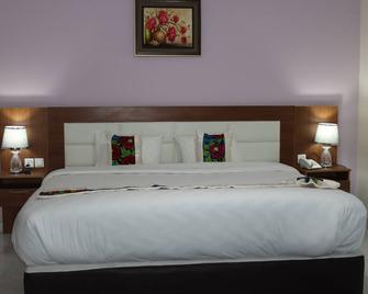 Rhogem Hotel - Takoradi - Camera da letto