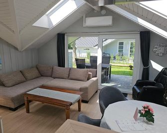 Dreibogen Ferienhaus Smaland - Glucksburg - Вітальня