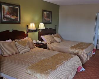 Legacy Inn & Suites - 格爾夫波特 - 格爾夫波特（密西西比州） - 臥室