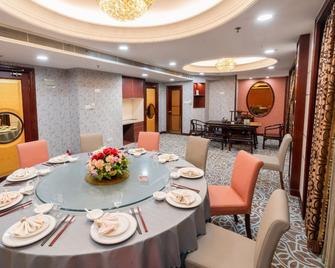 Nan Fang Yi Yuan Hotel - Cantón - Habitación