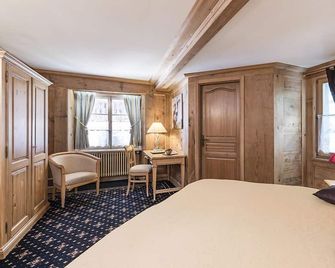 Romantik Hotel L'Etoile - Val-de-Charmey - Bedroom