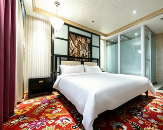Friday Holiday Hotel (Jiaozuo Xinfeng Er Street) - Jiaozuo - Bedroom