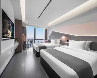 Wendy's Hotel (Chongqing Central Park Branch) - Chongqing - Camera da letto