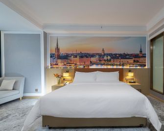 Vienna Hotels Yuncheng Hedong Street Wanda Store - يونتشنغ - غرفة نوم