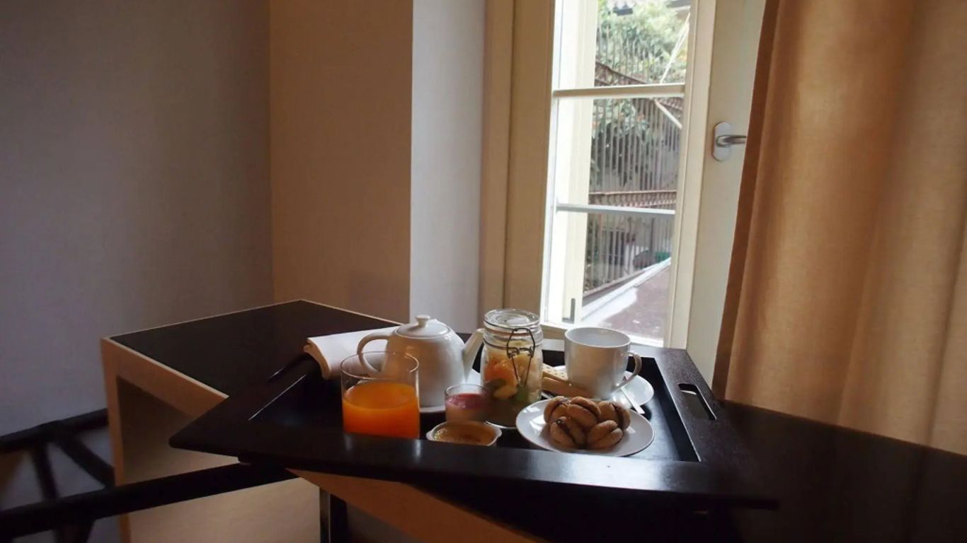 Parizzi Suites & Restaurant