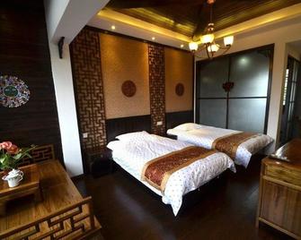 Huangshan Hongcun Sanyoutang Inn - Huangshan - Bedroom