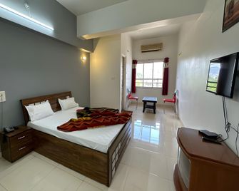 Hotel Sarang Lodging And Boarding - Sātāra - Bedroom
