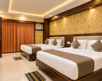 Hotel Rumani Puri - Puri - Makuuhuone