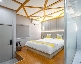 Hangzhou Dian Jia Hotel - Hangzhou - Habitación