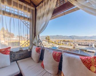 Jiuqi Dianyu Yangguang Inn - Lijiang - Balcony