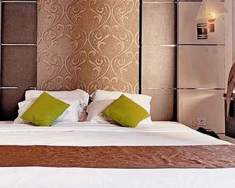 Royal Global Hotel - Palangkaraya - Bedroom