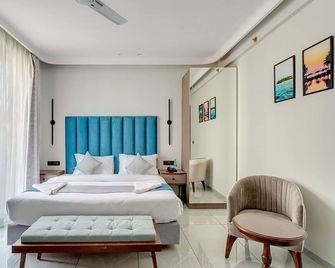 Baga Bliss by Celestiial Hospitality - Baga - Schlafzimmer
