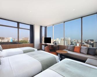 ريفيرسايد هوتل كوماموتو - كوماموتو - غرفة نوم