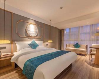 Fairyland Hotel Kunming Chuan Jin Branch - Kunming - Slaapkamer