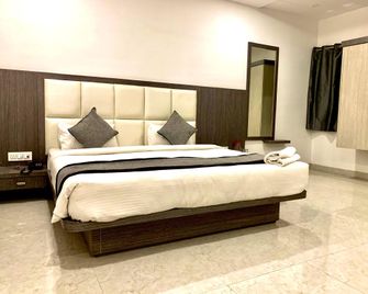 Hotel Anmol Era - Jabalpur - Slaapkamer