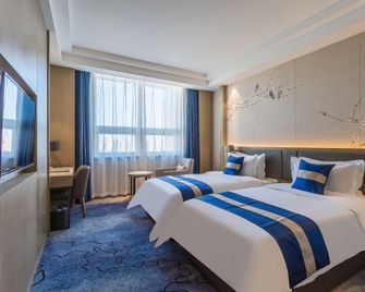 Huachen Lvyue Hotel - Huhhot - Yatak Odası
