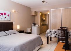 San Martin Suites - Bariloche - Schlafzimmer