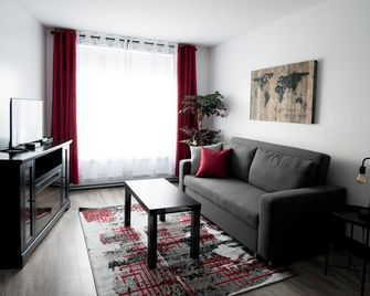 Loft with bed and sofabed in the city centre (Le Court-toit) - Rouyn-Noranda - Obývací pokoj