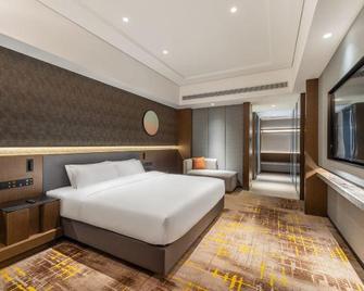 Shenyang Sanlong Spring Hotel - Shenyang - Camera da letto