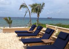 Waterfront Luxury and Privacy in 3 Master Suite Villa; Gorgeous Views Central AC - Cayman Brac - Beach