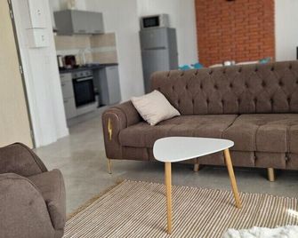 Deux appartements proche Disneyland - La Ferté-sous-Jouarre - Wohnzimmer