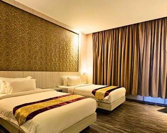Alltrue Sydney Hotel Batam Center - Batam - Bedroom
