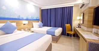 Makati Crown Regency Hotel - מאקאטי סיטי - חדר שינה
