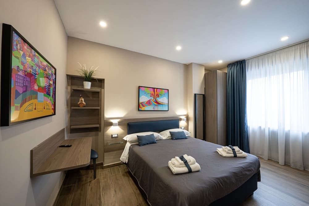 Famalu apartments - Неаполь - Спальня