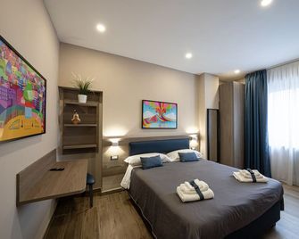 Famalu apartments - Неаполь - Спальня