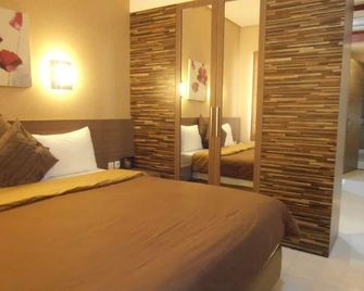 Tirta Mansion Premier - Tangerang City - חדר שינה