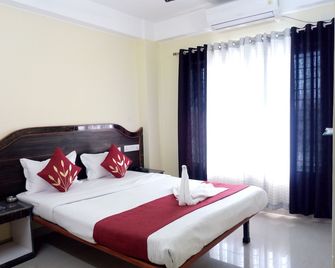Hotel Niladrii Galaxy - Shiliguri - Schlafzimmer