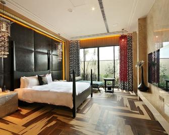 Mulan Motel - טאיצ'ונג - חדר שינה