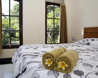 Timbis Homestay Bali - South Kuta - Habitación