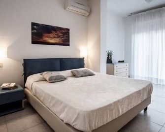 Residence La Rosa di Nettuno - Marina di Grosseto - Camera da letto