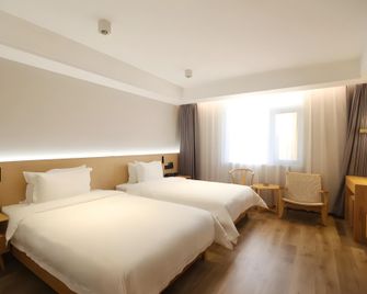 Floral Hotel·Luyixiang Village hotel (Jiujiang Lushan Beihai Resort Area) - Jiujiang - Habitación