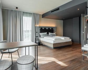Freshsuites & Bar - Dachau - Ložnice