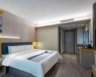 Home Inn Style Jinan Honglou South Road Shandong University - ז'ינאן - חדר שינה