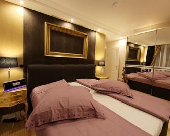Golden Apartments - Essen - Chambre