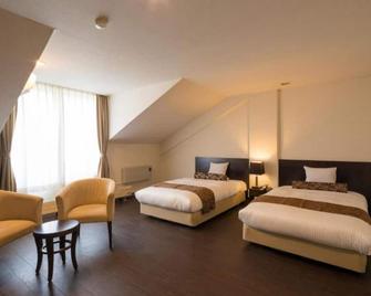Deluxe Twin Room Nonsmoking / Semboku Akita - Semboku - Schlafzimmer
