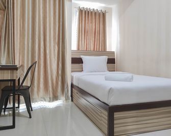 Cozy and Best Deal Studio Apartment Vida View Makasar - Makassar - Bedroom
