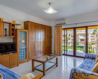 Serene Apartment W/ Balcony and Pool by LovelyStay - Quarteira - Living room