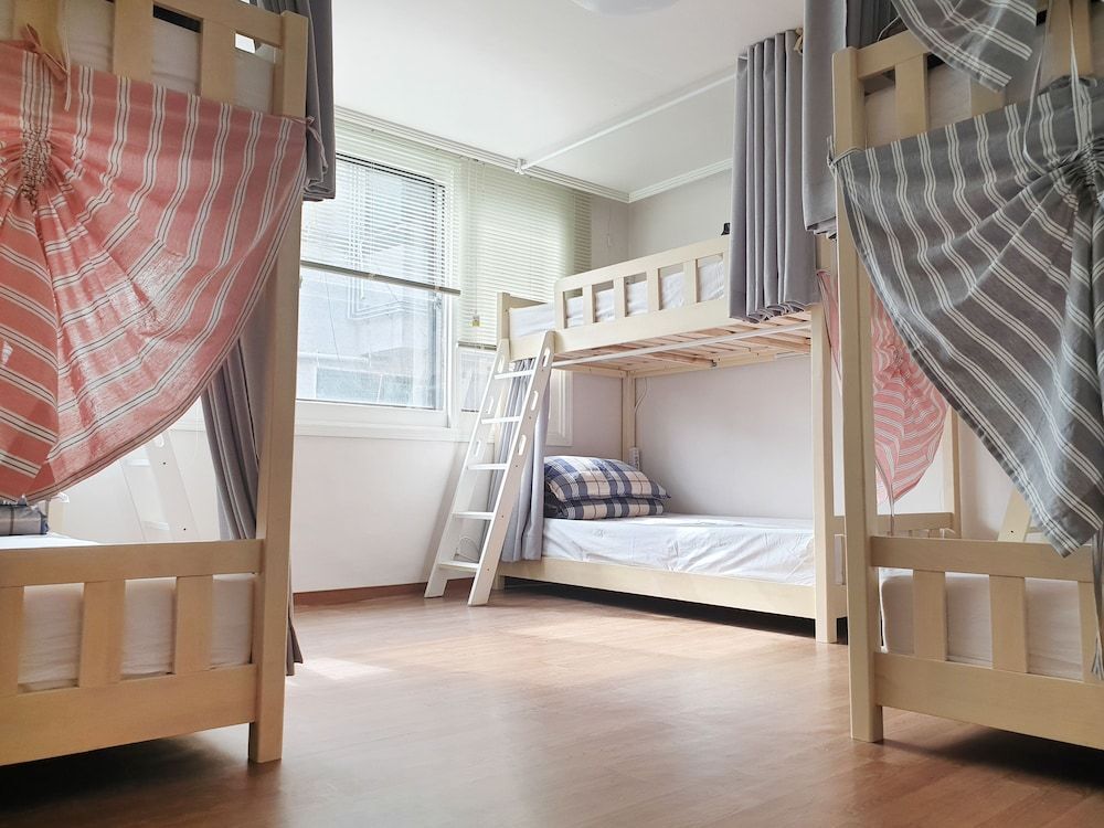 Hongdae Cheese Guesthouse - סיאול - חדר שינה