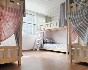 Hongdae Cheese Guesthouse - סיאול - חדר שינה