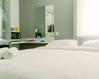 Cozy Studio Apartment At Aeropolis Residence Near Cgk Airport - Tangerang City - Schlafzimmer